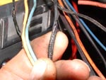 Assorted melted wires in the engine harness