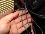 Assorted melted wires in the engine harness